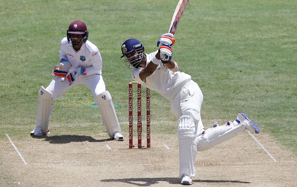 Lokesh Rahul hits a six off West Indies' Devendra Bishoo