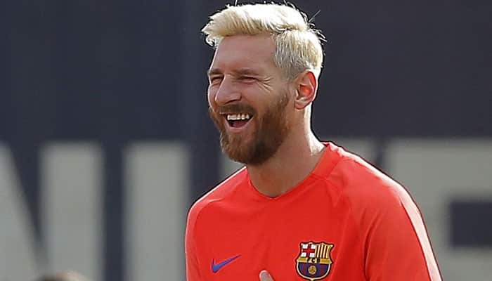 WHAT ON EARTH: Lionel Messi goes blond and Twitter explodes