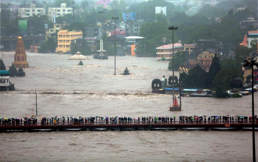 A view of a flooded locality after incessant rains in Nashik