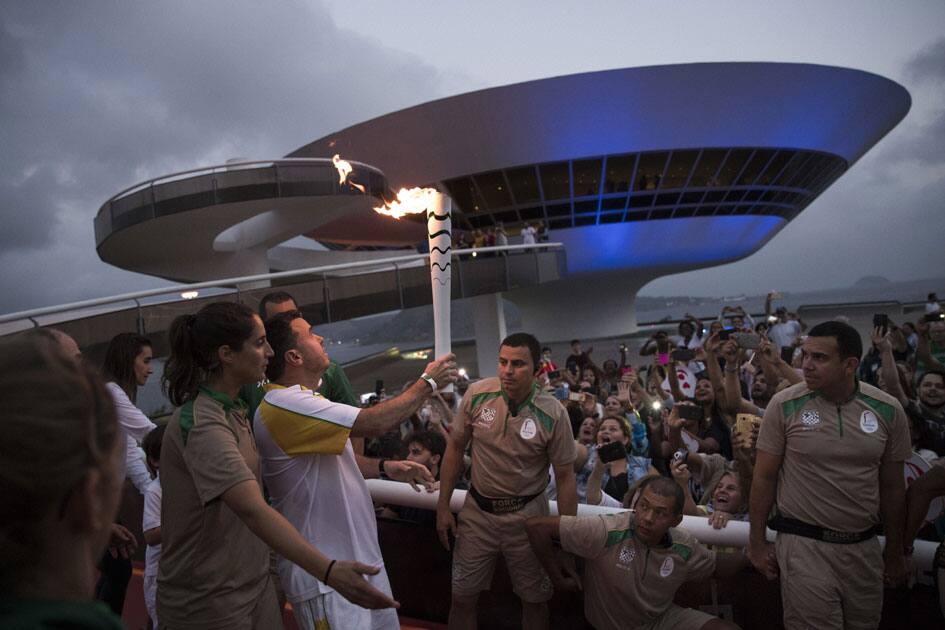 Rodrigo Pontes carries the Olympic torch