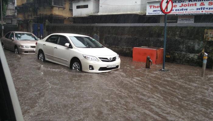 Mumbai crawls as heavy rains cause waterlogging, traffic snarls; BMC issues high tide alert