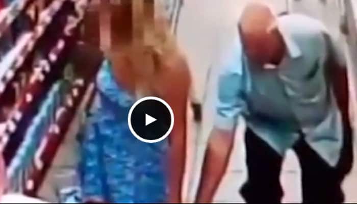 What a shame! Elderly man caught taking photo under a girl&#039;s skirt – Watch video
