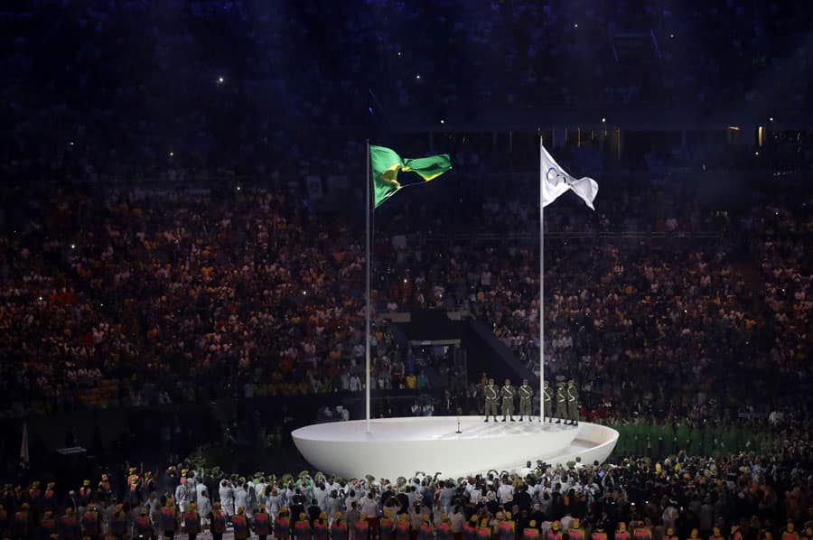 The Olympic and Brazil flag fly