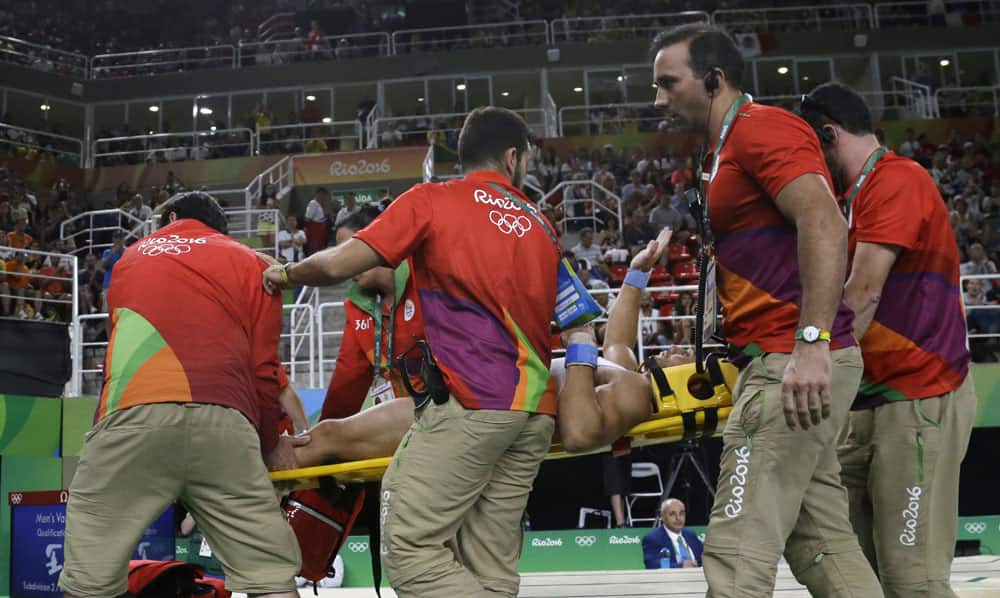France's Samir Ait Said is carried away on a stretcher
