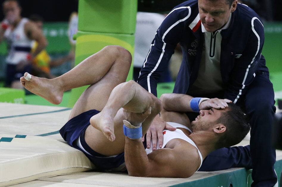 Samir Ait Said holds his leg after injuring it