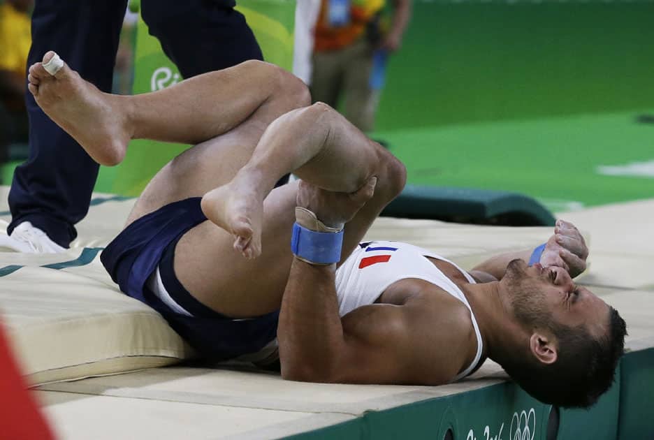 Samir Ait Said holds his leg after injuring it