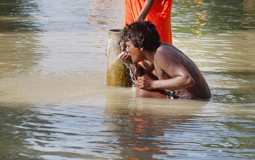 A man drinking water