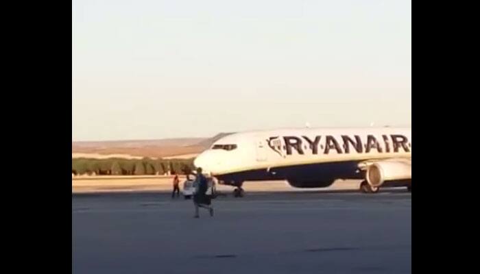 Bizarre! Man chases flight across tarmac at Madrid airport hoping to catch it in last minutes