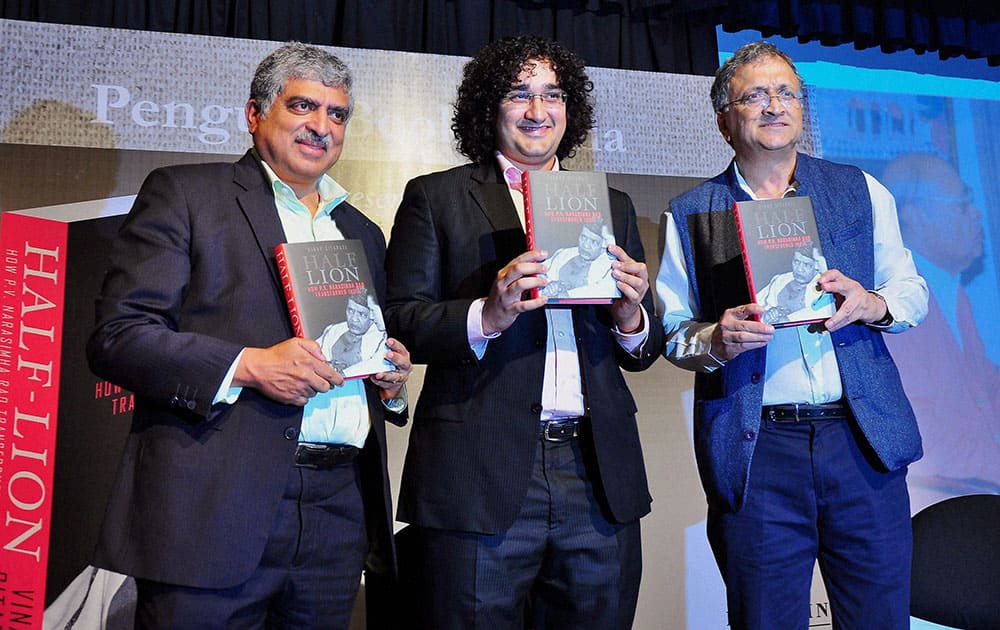 Former UIDAI chairman Nandan Nilekani and writer Ramachndra Ghuha relese the book Half Lion