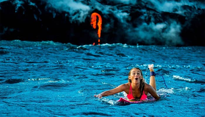 Incredible! This lady surfed next to erupting volcano in Hawaii; Watch stunning video and pics