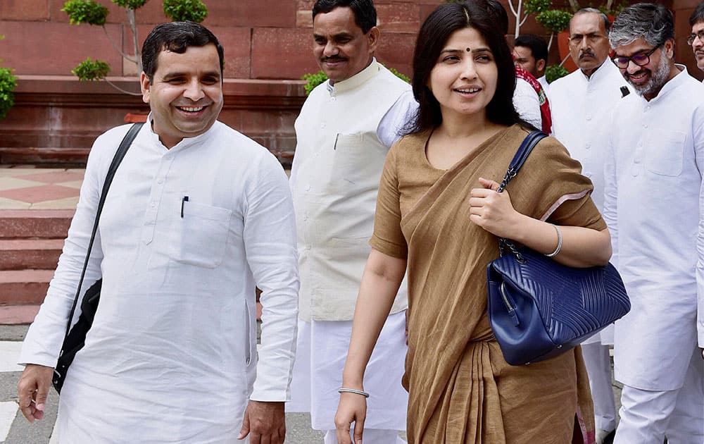 Samajwadi Party MP Dimple Yadav with party leaders at Parliament house during the monsoon session in New Delhi