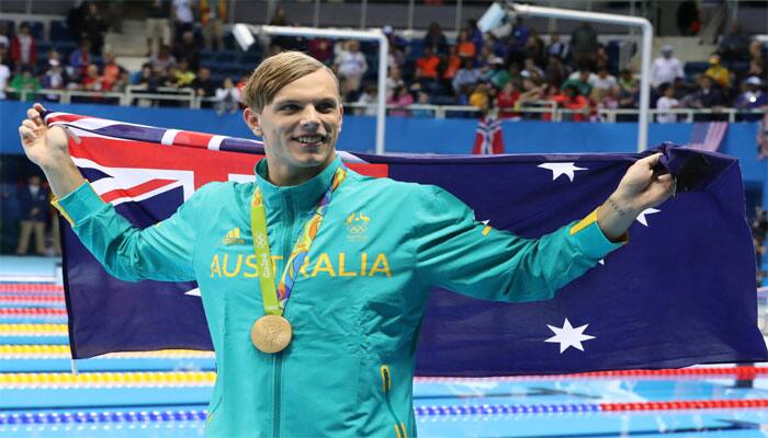 Aussie dad sees footy future for gold medal swimmer 