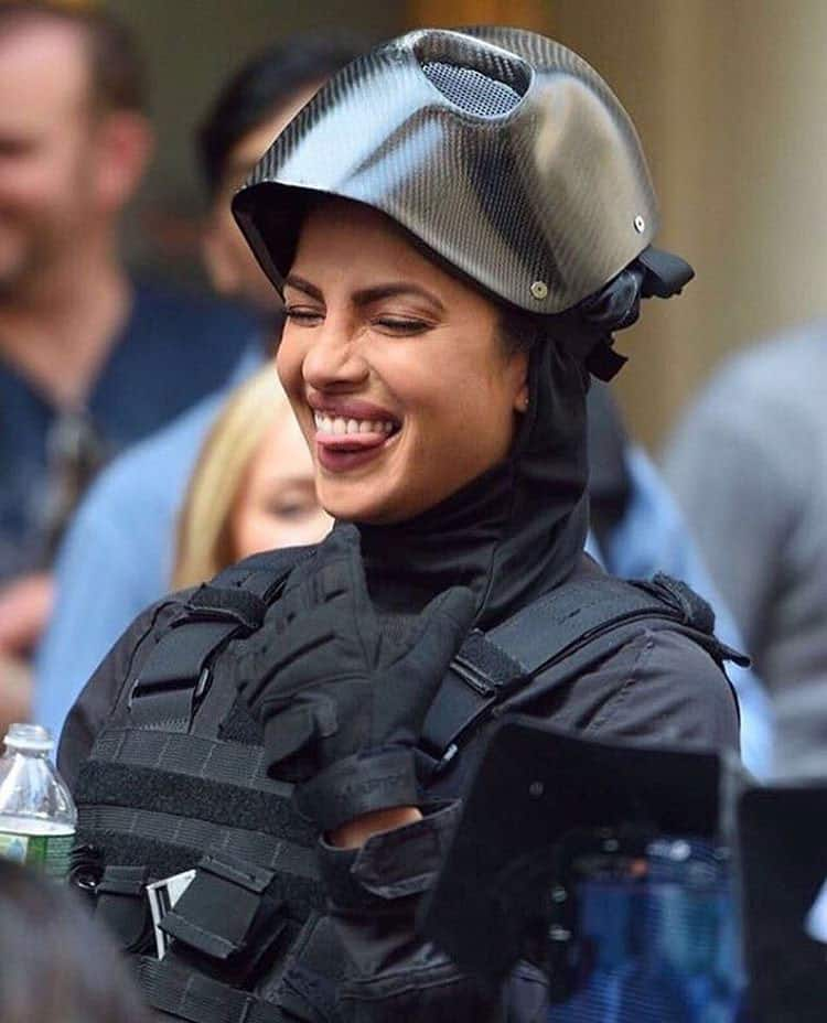 filmfare :- #PriyankaChopra has all her followers to #CaptionThis picture of her's from the sets of #Quantico