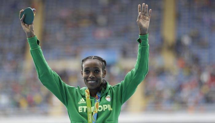 Ethiopia&#039;s Almaz Ayana shatters world record to win 10,000 meter race