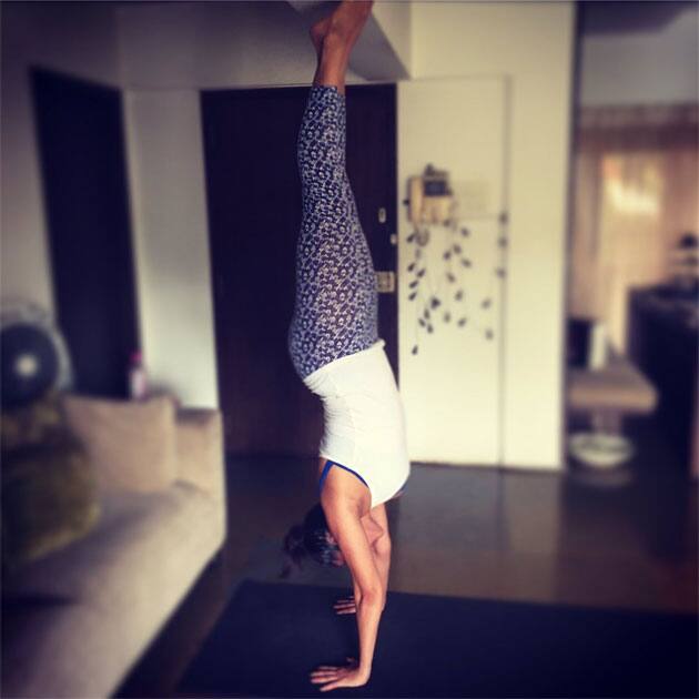 #upsidedown mornings like these- Neha Dhupia