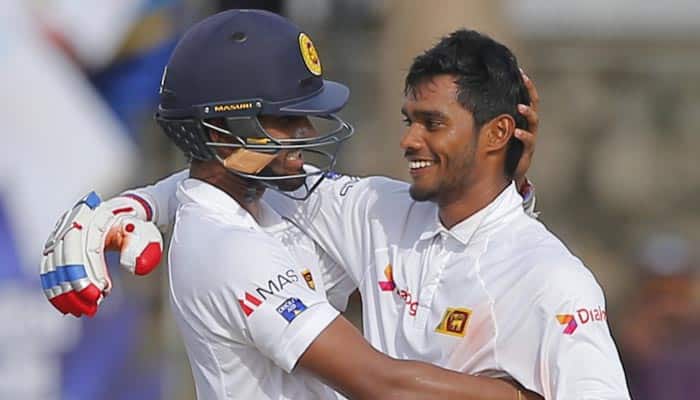 Dhananjaya de Silva leads Sri Lanka fightback with his maiden hundred against Australia in Colombo