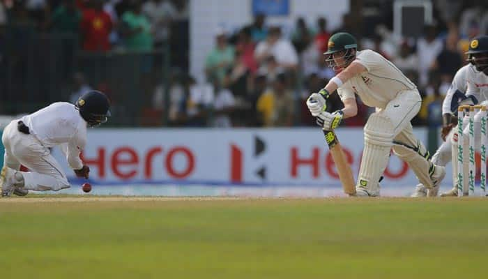 Steven Smith and Shaun Marsh half-centuries keep Australia afloat in Colombo Test against Lanka