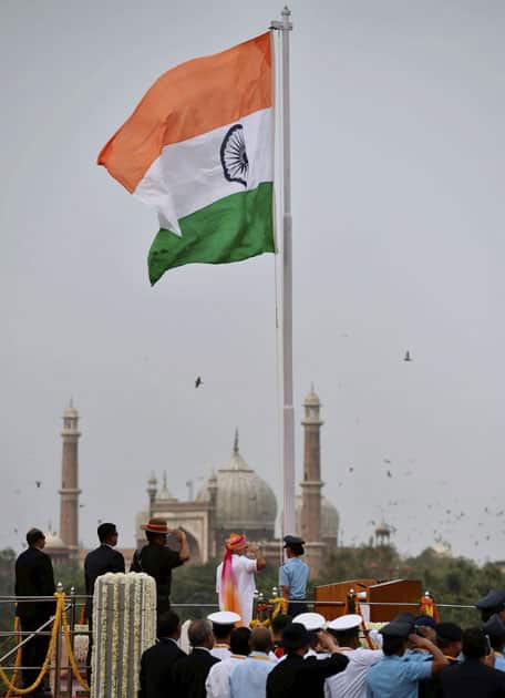 Narendra Modi salutes the national flag