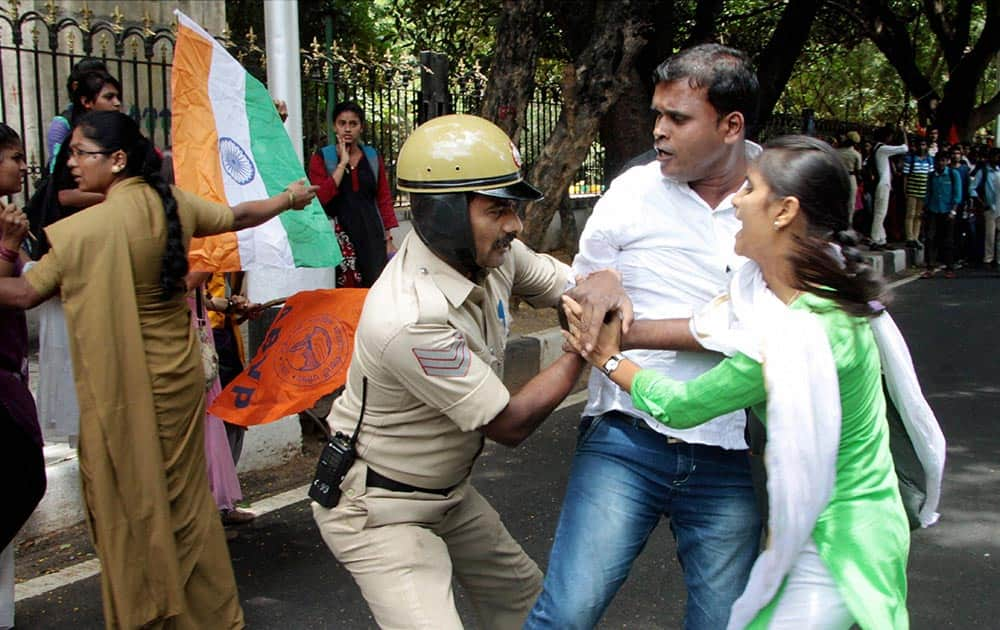 Police stop the students and ABVP activists