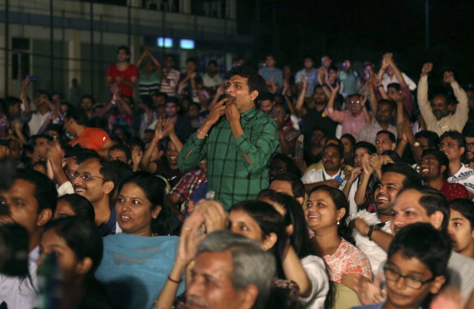 supporters of India's badminton star Pusarla Sindhu, cheer