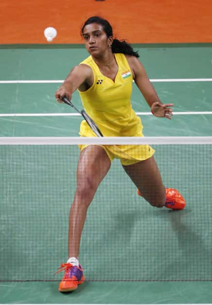 India's V. Sindhu Pusarla returns a shot