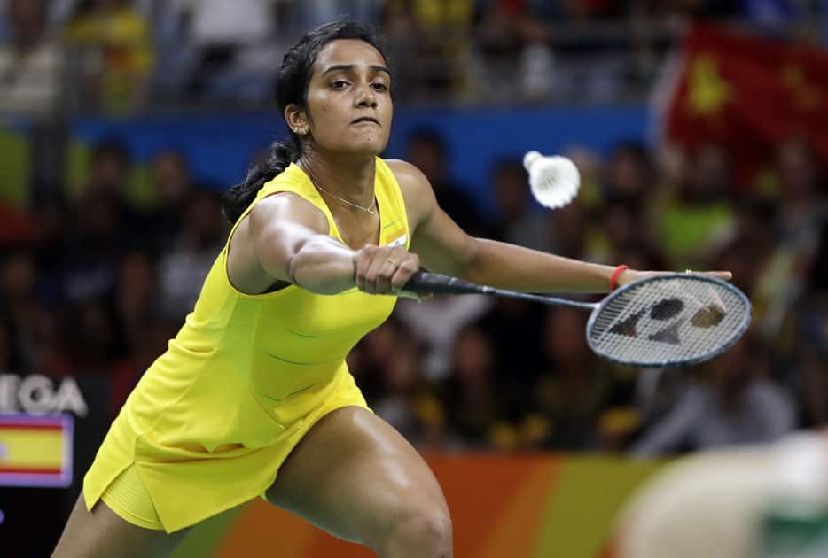 India's V. Sindhu Pusarla returns a shot