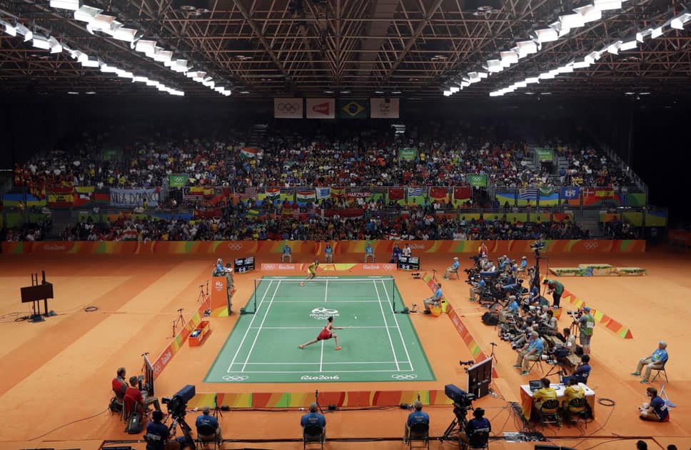 Spain's Carolina Marin, foreground, plays India's V. Sindhu Pusarla