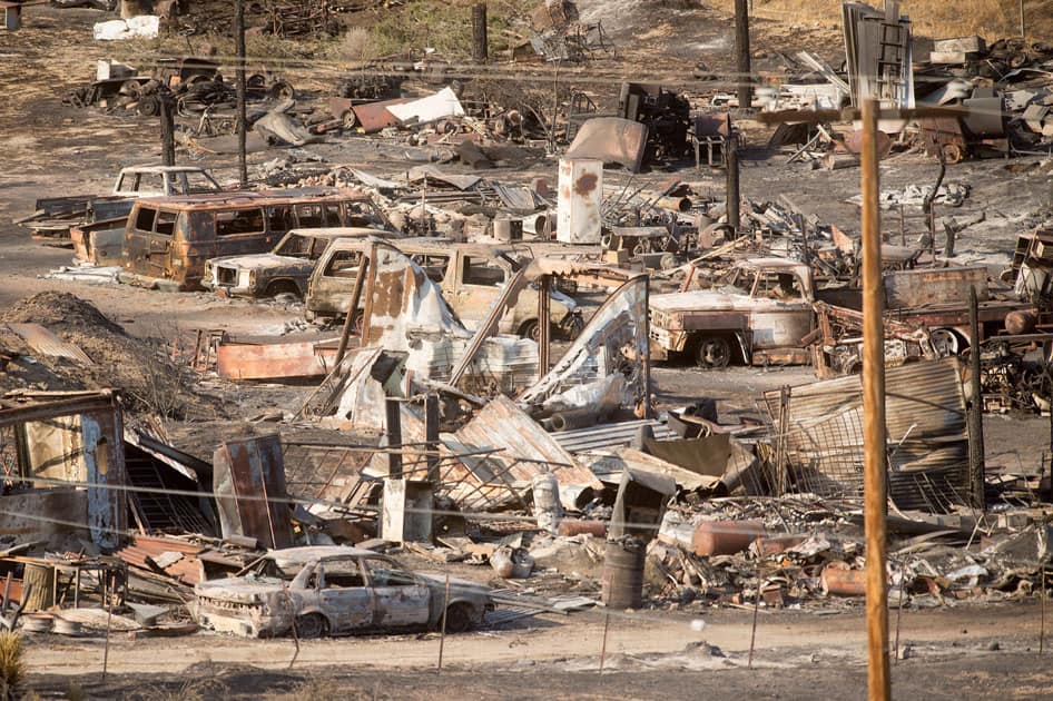 Scorched cars and trailers burned Scorched cars and trailers burned
