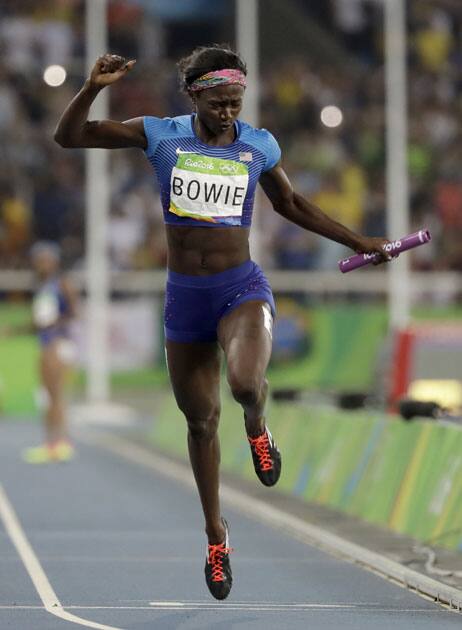 United States's Tori Bowie crosses the line to win the gold medal