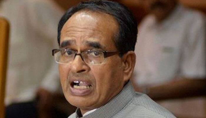When MP CM Shivraj Singh Chouhan got &#039;lift&#039; from cops during visit to flood-hit areas; image goes viral - Pic inside