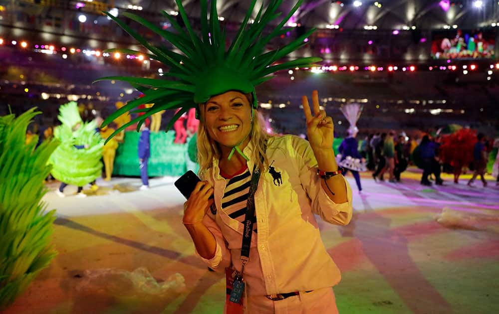 United States' Morghan King poses for picture during the closing ceremony in the Maracana stadium at the 2016 Summer Olympics in Rio de Janeiro, Brazil