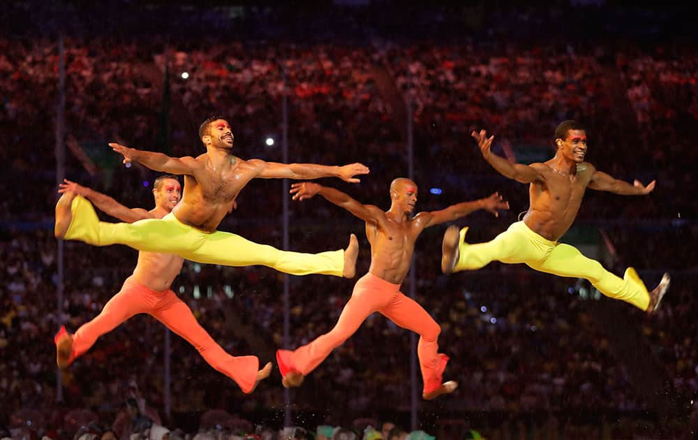 Dancers perform during the closing ceremony in the Maracana stadium at the 2016 Summer Olympics