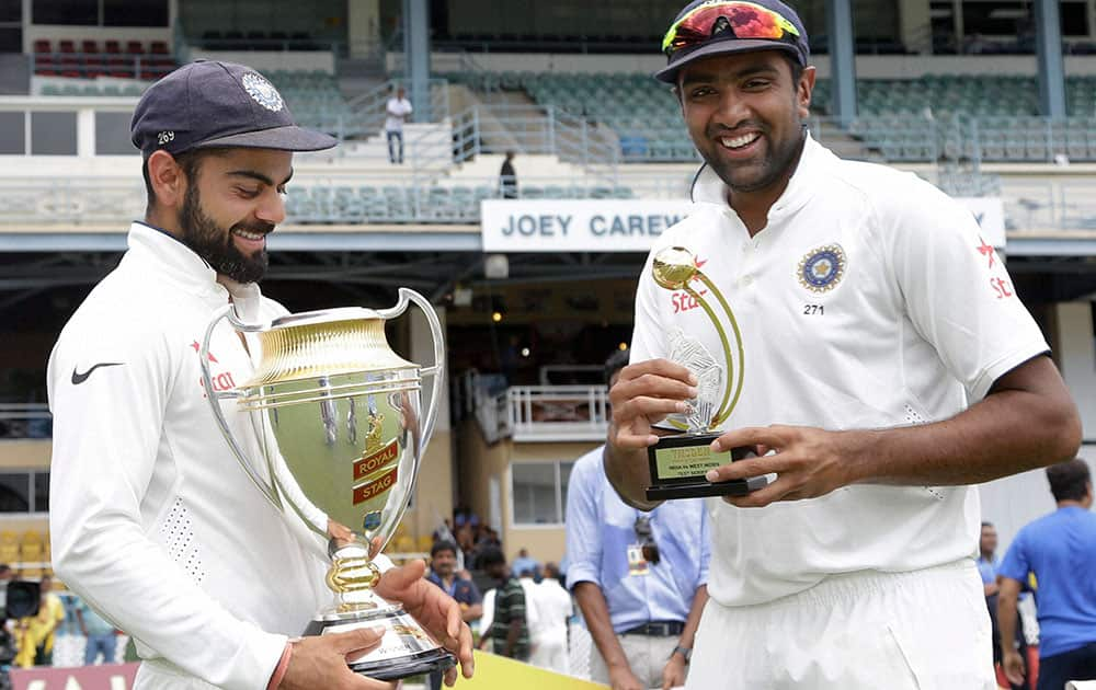 Virat Kohli holds the trophy for the Test match series Royal Stag Cup 2016