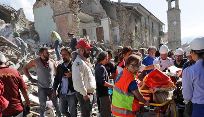 &quot;Voices under the rubble&quot; after quake hits Italy; at least 38 dead