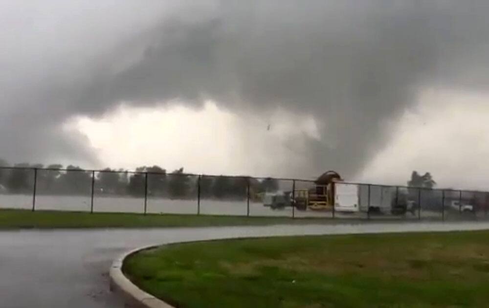 This image made from a video shows a tornado, in Kokomo, Ind. 