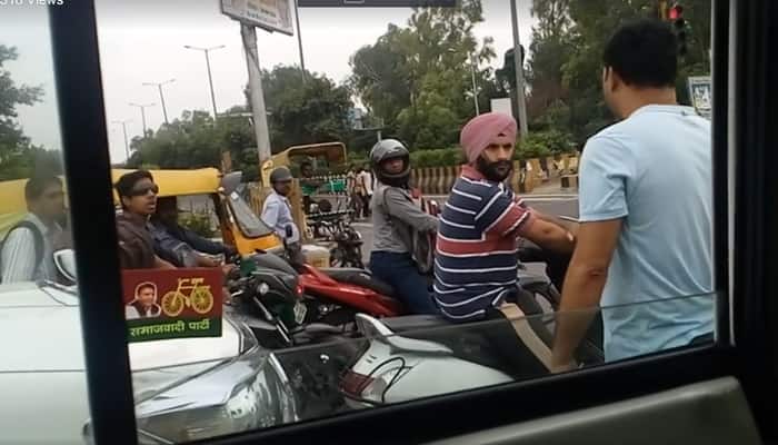 CAUGHT ON CAMERA: This man doesn&#039;t give a damn to traffic rules, threatens people on Noida roads; his car has VIP horn - WATCH