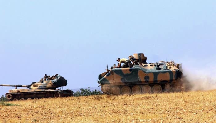 Turkey sends more tanks to Syria, warns Kurdish militia