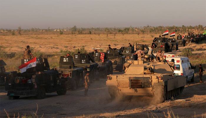 Iraqi forces retake key town south of Mosul