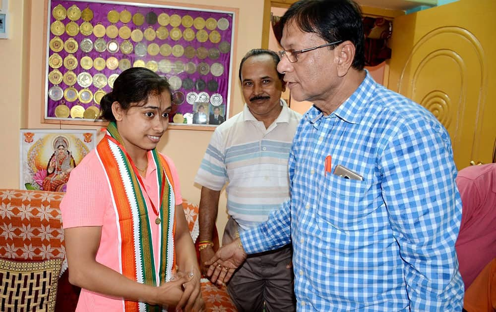 Kolkata East Bengal Football Club ex- president gifts a diamond jewellery medal to gymnast Dipa Karmakar