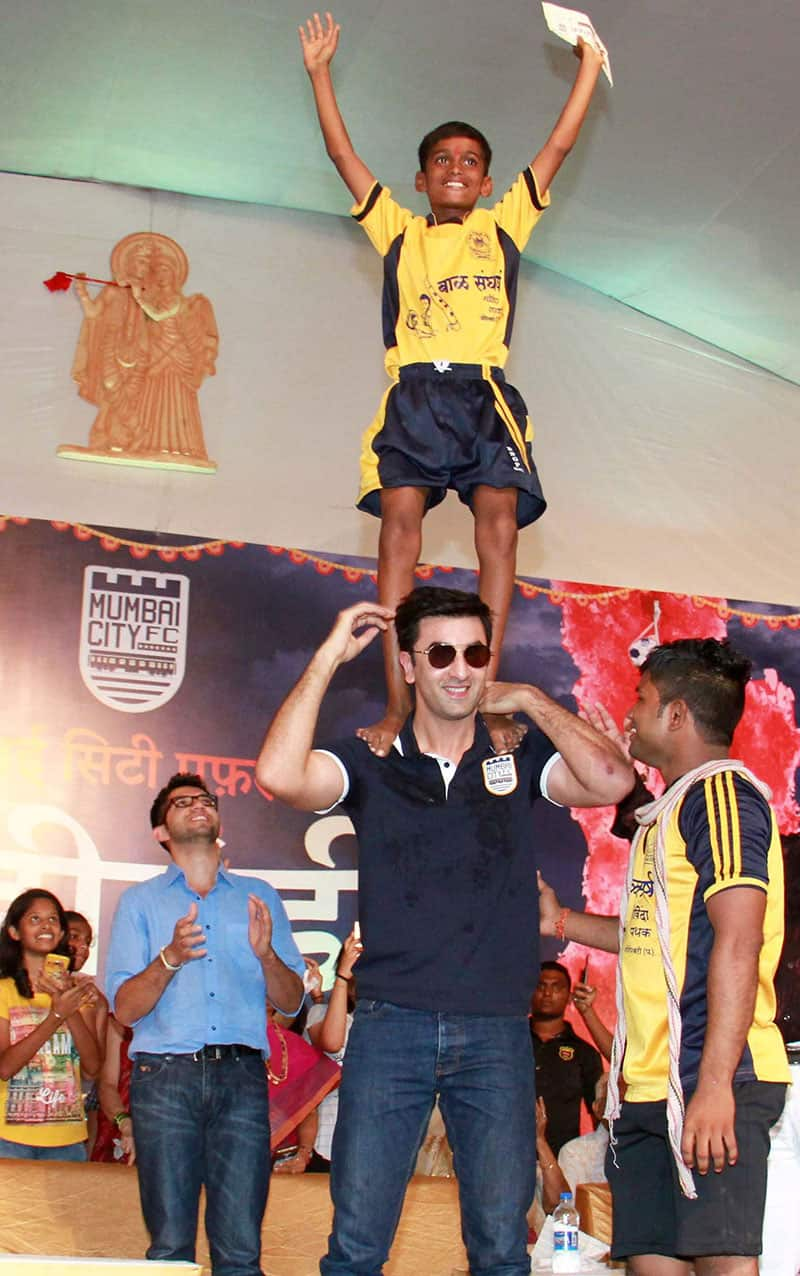 Actor Ranbir Kapoor with govinda on the occassion of Janmashtami celebration in Mumbai