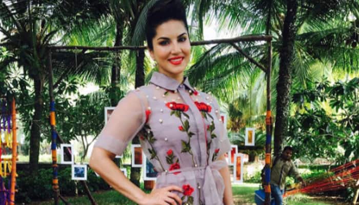 Looks like it takes a lot of men to doll up Sunny Leone- See pic