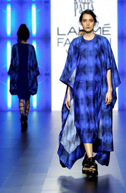 Models showcase creations by designer Kallol Dutta