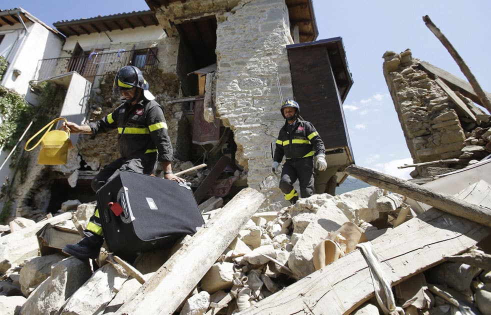 Firefighters helps a man