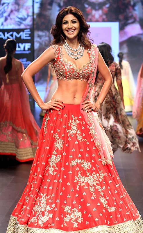 Bollywood actor Shilpa Shetty displays the creation of fashion designer Anushree Reddy during the Lakme Fashion Week
