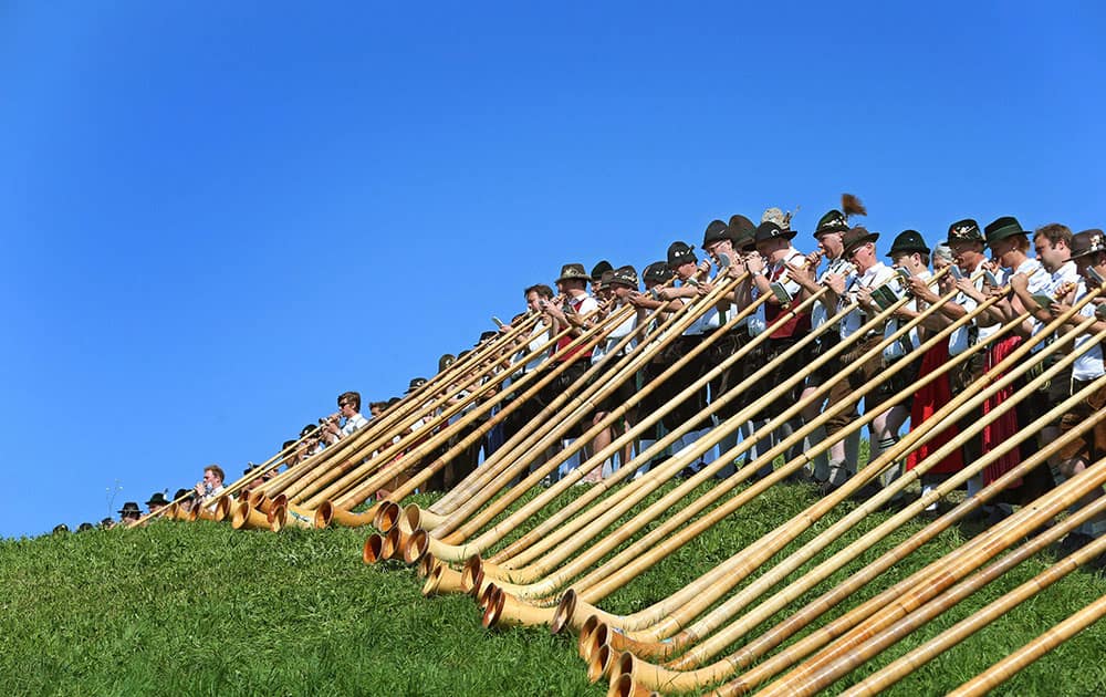 Alphorn musicians perform in Nesselwang, southern Germany