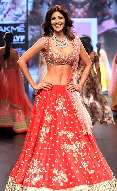 Bollywood actor Shilpa Shetty displays the creation of fashion designer Anushree Reddy during the Lakme Fashion Week 