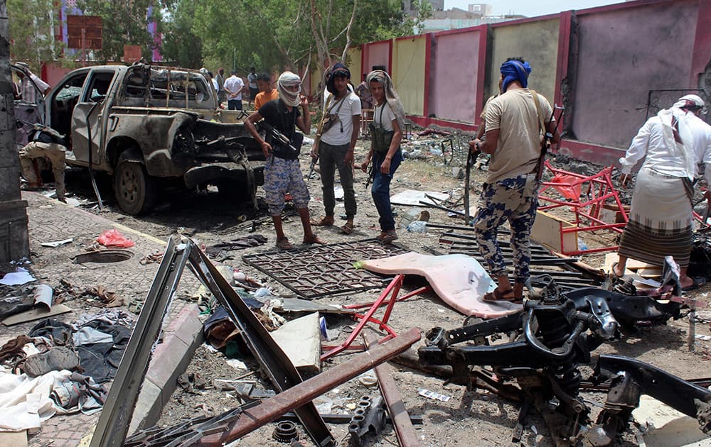 Fighters loyal to the government gather at the site of a suicide car bombing in Yemen‚ a southern city of Aden, Yemen Fighters loyal to the government gather at the site of a suicide car bombing in Yemen‚ a southern city of Aden, Yemen
