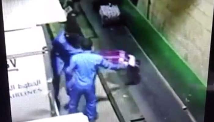 WATCH: Saudi Arabian baggage handlers toss passengers&#039; luggage on conveyor belt