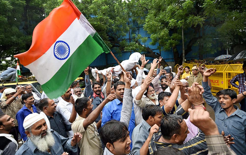 All Delhi Auto Taxi Transporters Congress Union members holding a protest outside Delhi Chief Minister Arvind Kejriwals residence in New Delhi All Delhi Auto Taxi Transporters Congress Union members holding a protest outside Delhi Chief Minister Arvind Kejriwals residence in New Delhi