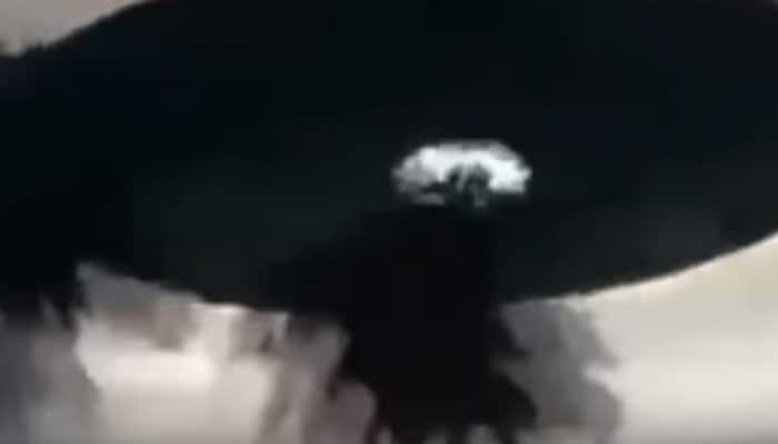 OMG! Huge UFO captured gliding over remote village in Malaysia - Watch viral video